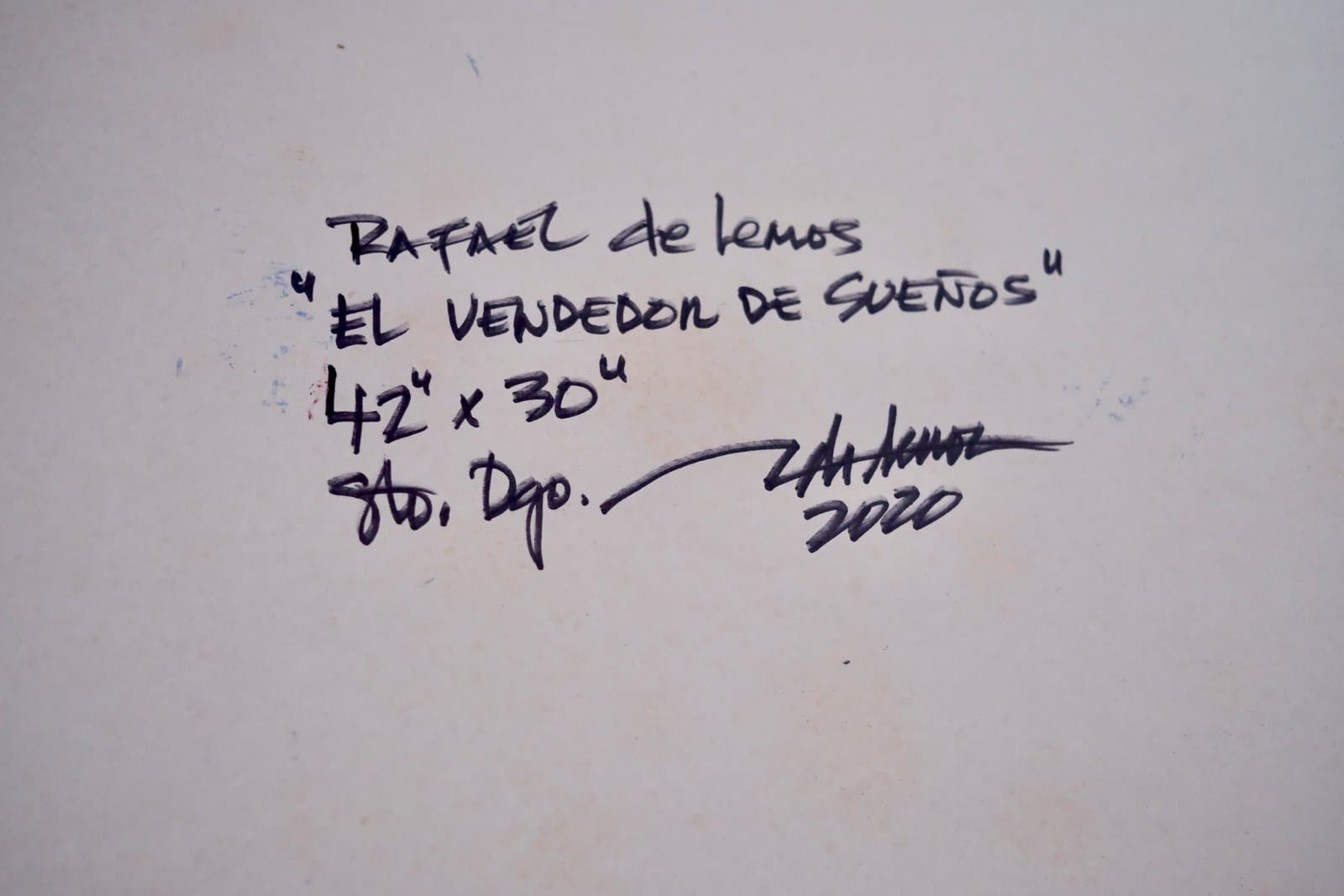 Reverso firmado de "El vendedor de sueños", título, medidas y año manuscritos