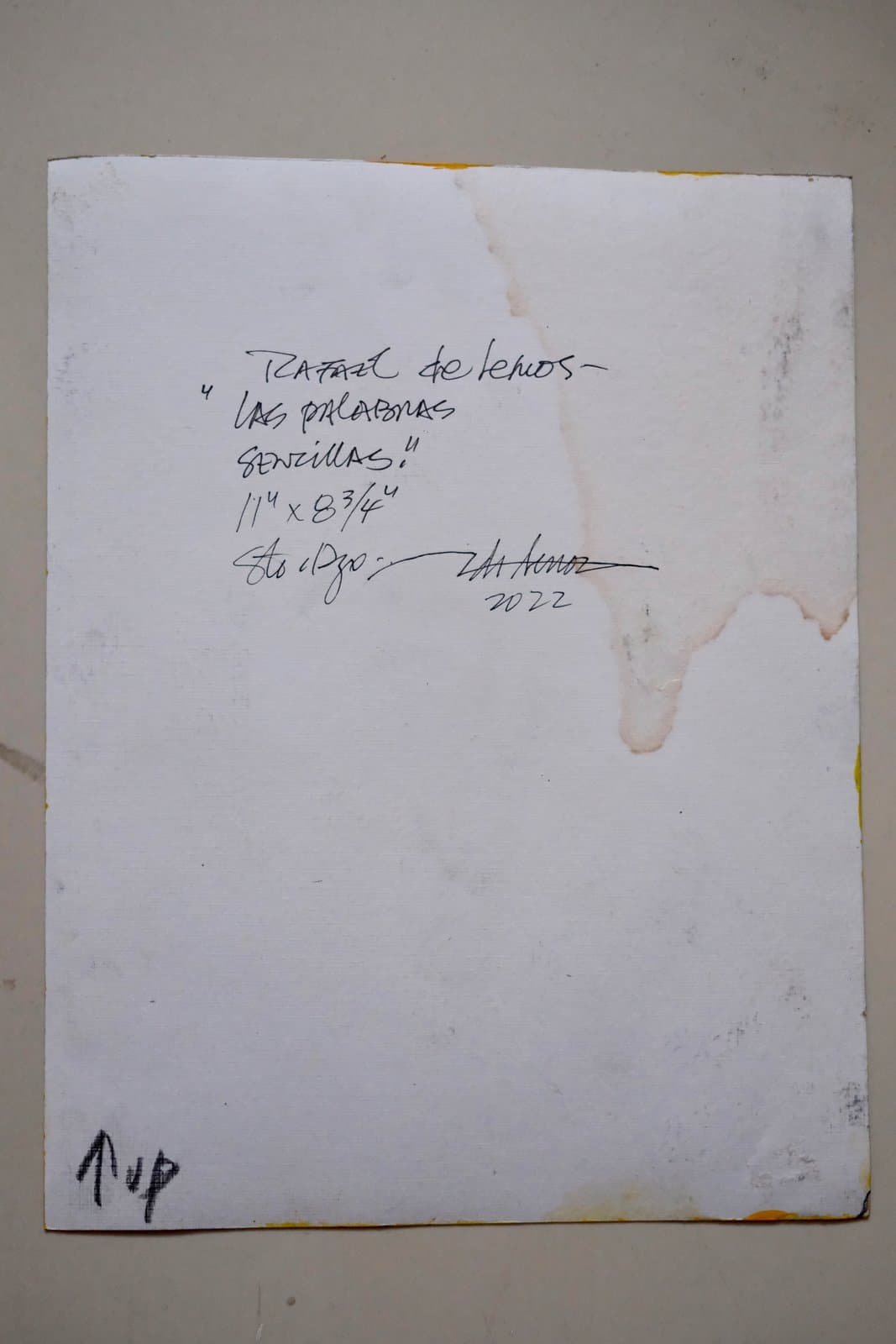 Reverso firmado de "Las palabras sencillas", título, medidas y año manuscritos