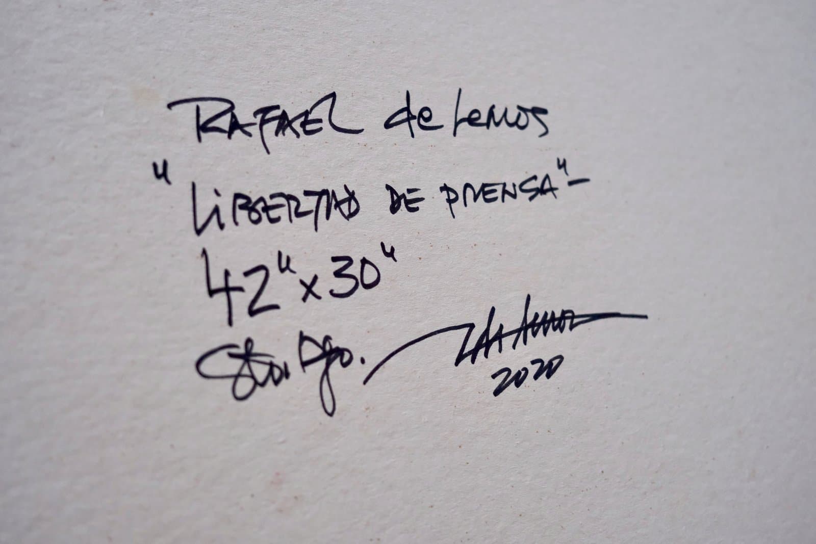 Reverso firmado de "Libertad de prensa", título, medidas y año manuscritos