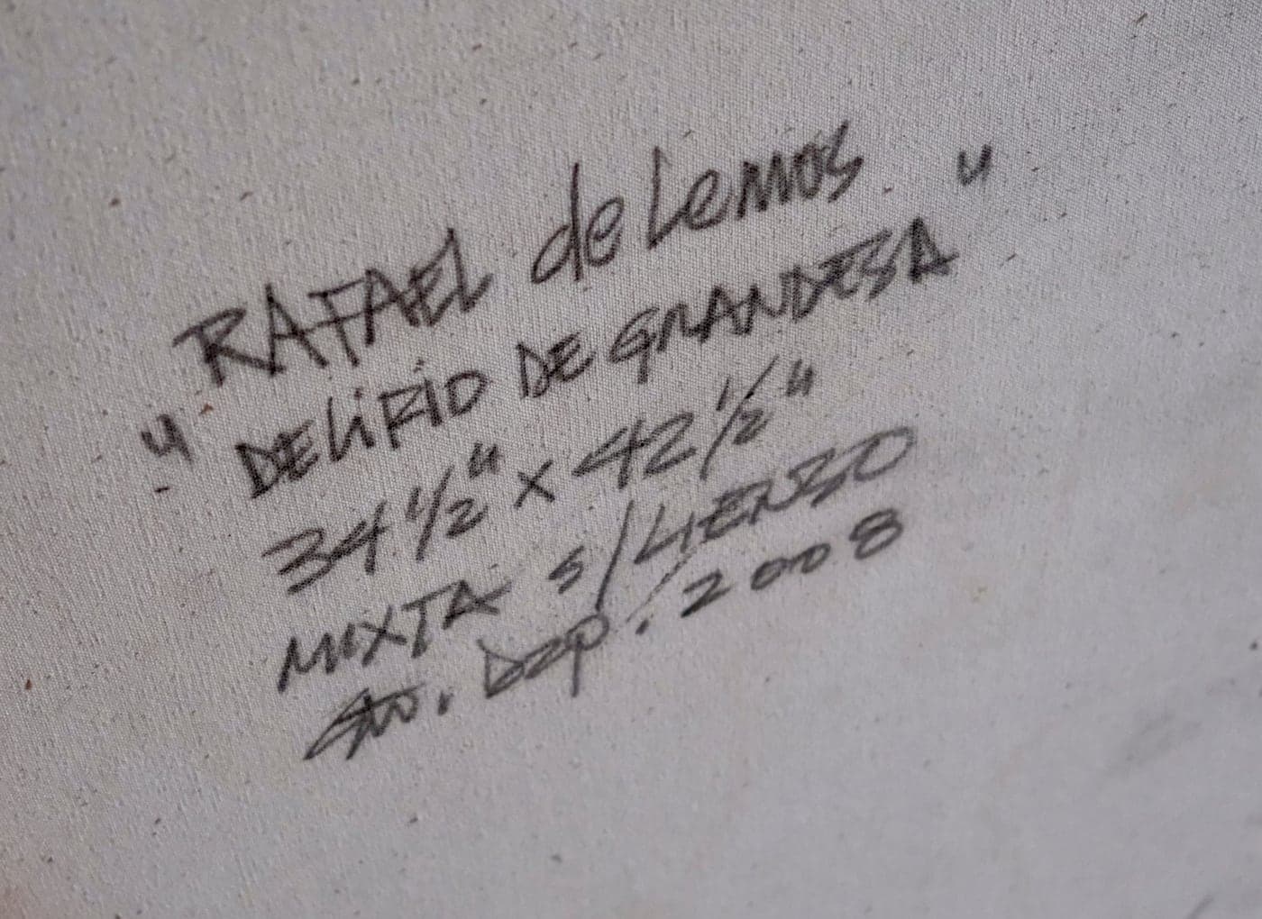 Reverso firmado de "Delirio de grandeza": título, medidas y año manuscritos